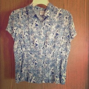 A multi colored blue top